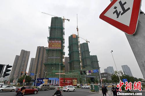資料圖:在建商品房 <a target='_blank' href='http://www.chinanews.com/'></p><p  align=