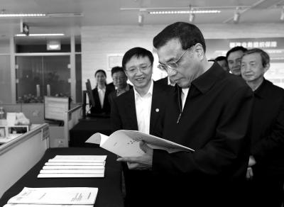 李克強叮囑銀行員工多去棚戶區看看 將心比心